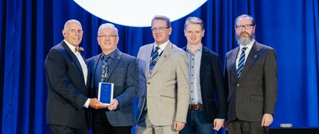 people accepting awards at aci convention