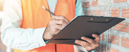 building code official with a checklist