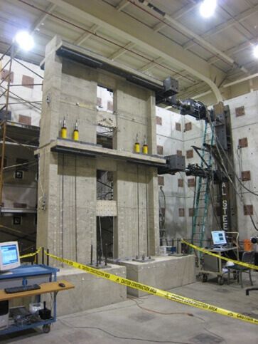 Seismic Response of Fiber-Reinforced Concrete Coupled Walls