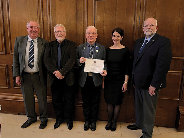 Robert Lewis, FACI (center), receiving the Silver Medal at the ICT Annual General Meeting in Dublin, Ireland. Also pictured from left are Gareth David, Honorary Treasurer of ICT; John Nehasil, ACI Senior Managing Director of Certification and Chapters; ACI President Maria Juenger; and Michael Morrison, ACI Director of Certification Program Development.